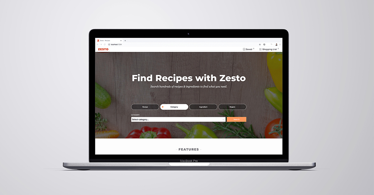 Macbook pro against gray background with a screen that says find recipes with Zesto